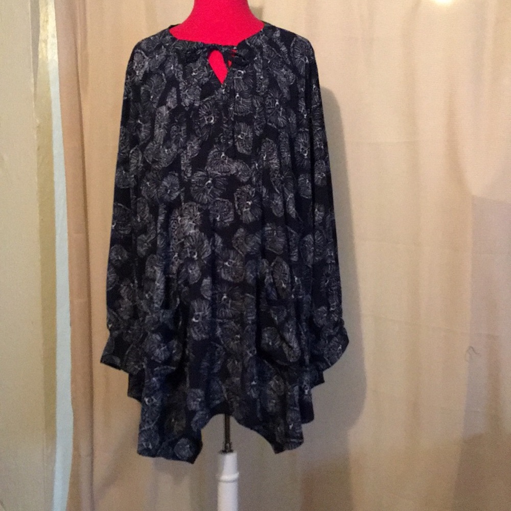 Beautiful blouse with nice details.